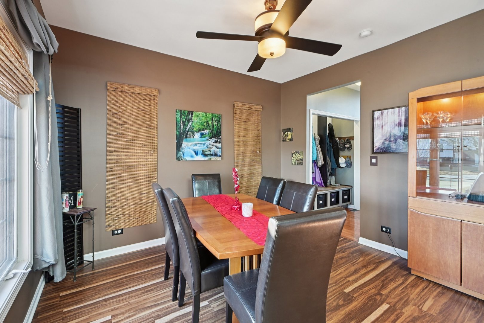 16385 Celtic Circle Manhattan, IL 60442 - Photo 7 of 49 a view of a dining room with furniture window and wooden floor