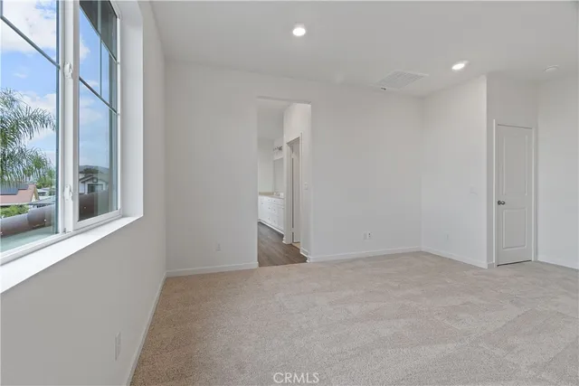 an empty room with a natural light