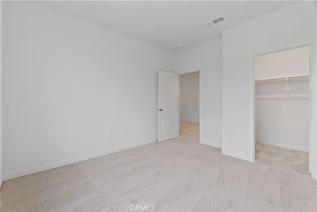 an empty room with an entryway