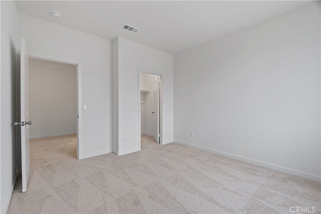 12764 Clifton Way Yucaipa, CA 92399 - Photo 17 of 24 a view of an empty room