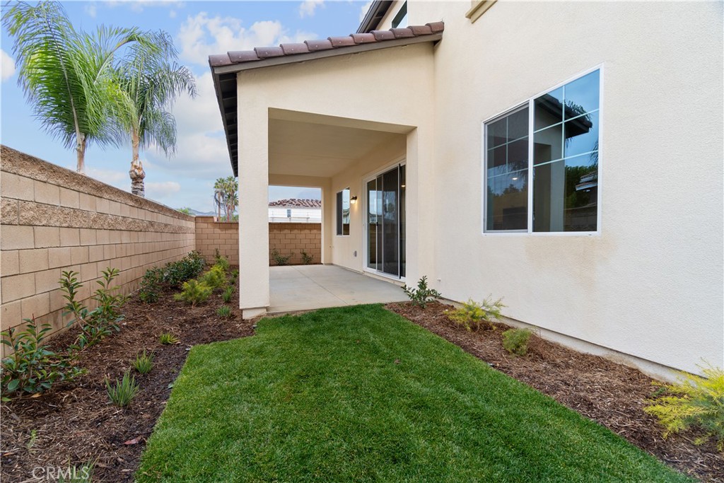 12764 Clifton Way Yucaipa, CA 92399 - Photo 20 of 24 a house view with a garden space