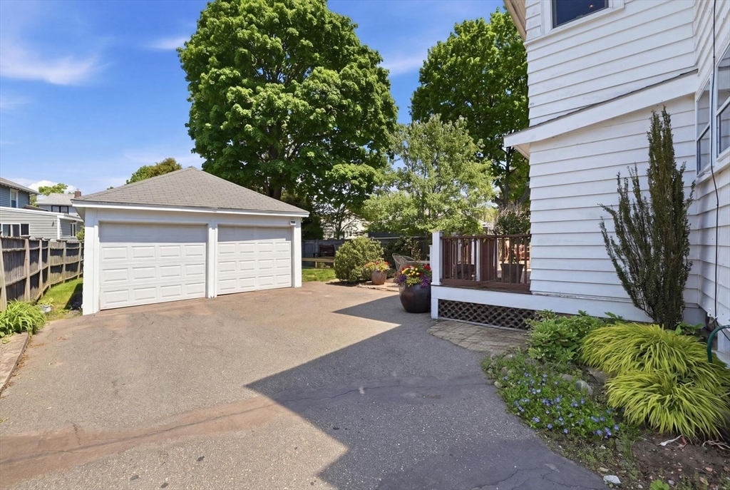19 Humphrey Street Marblehead, MA 01945 - Photo 27 of 29 a front view of a house with a yard and garage