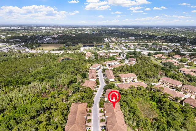 an aerial view of residential house with parking space