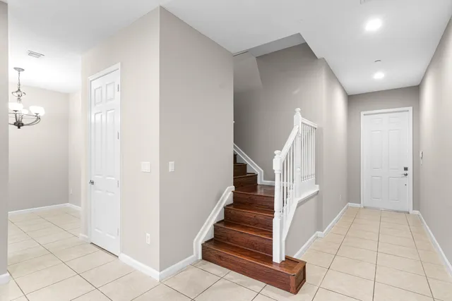a view of entryway with white walls and open area