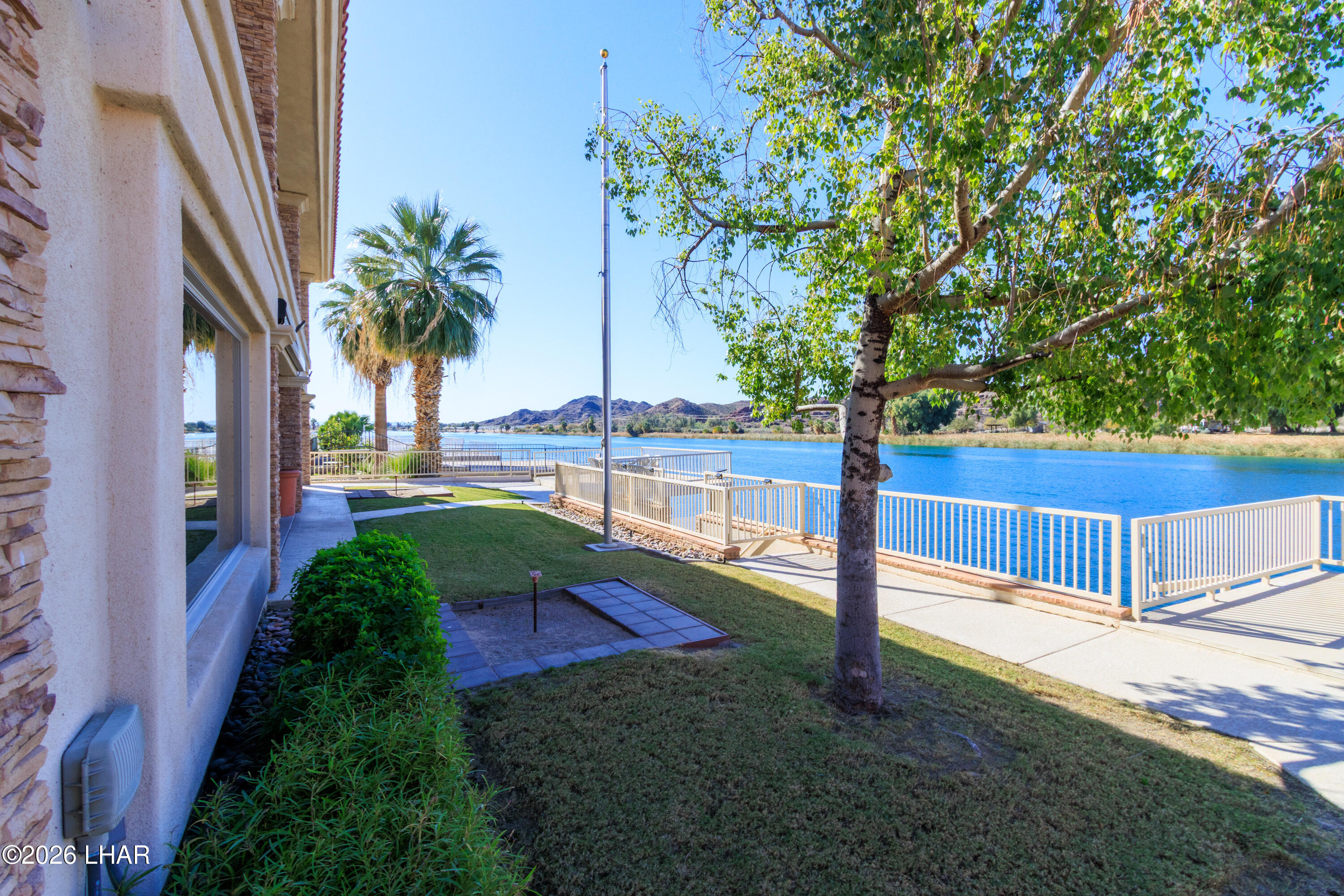 6674 Riverside Drive Parker, AZ 85344 - Photo 11 of 57 a view of a yard with an outdoor space