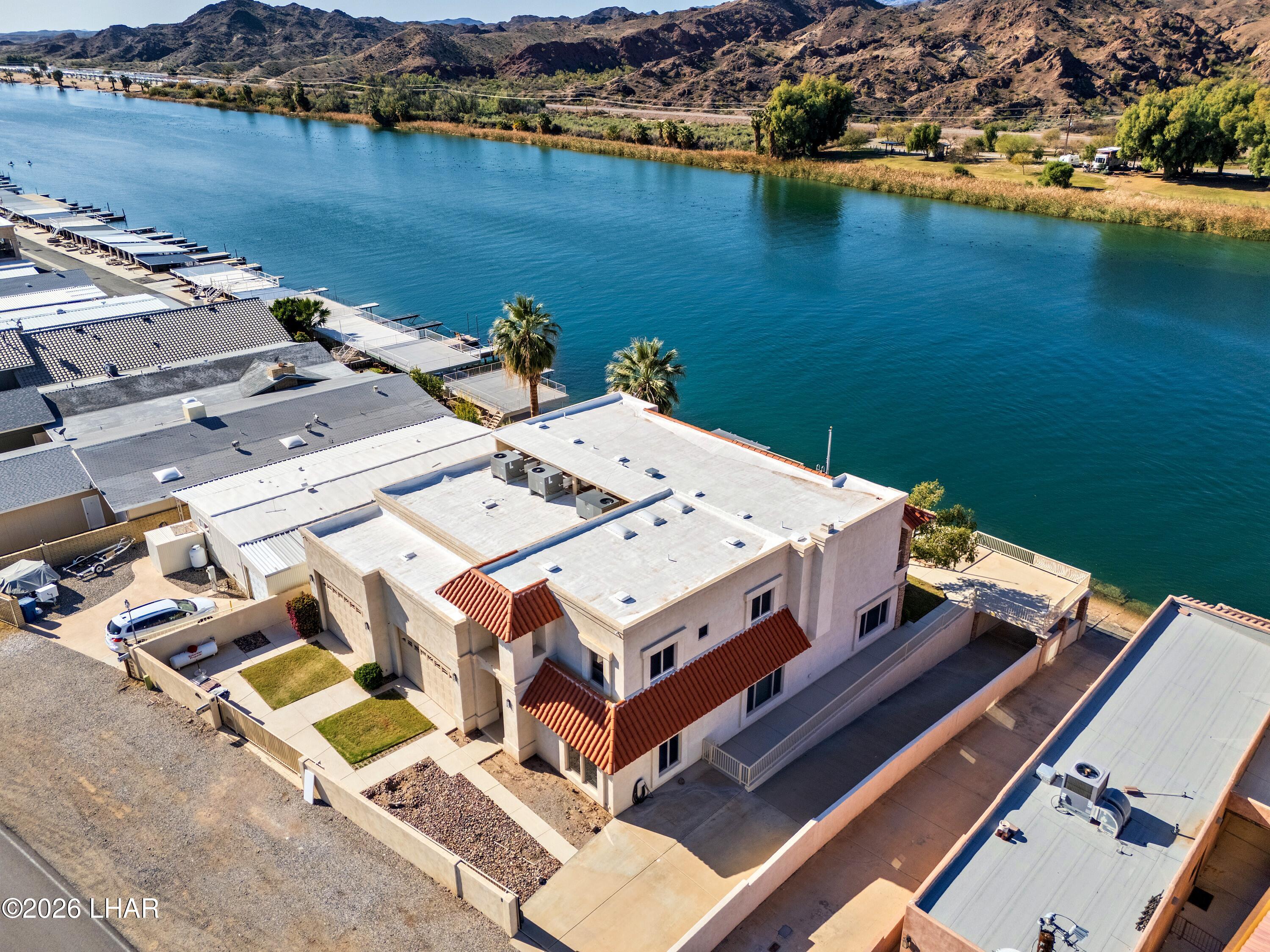 6674 Riverside Drive Parker, AZ 85344 - Photo 5 of 57 an aerial view of a house with lake view