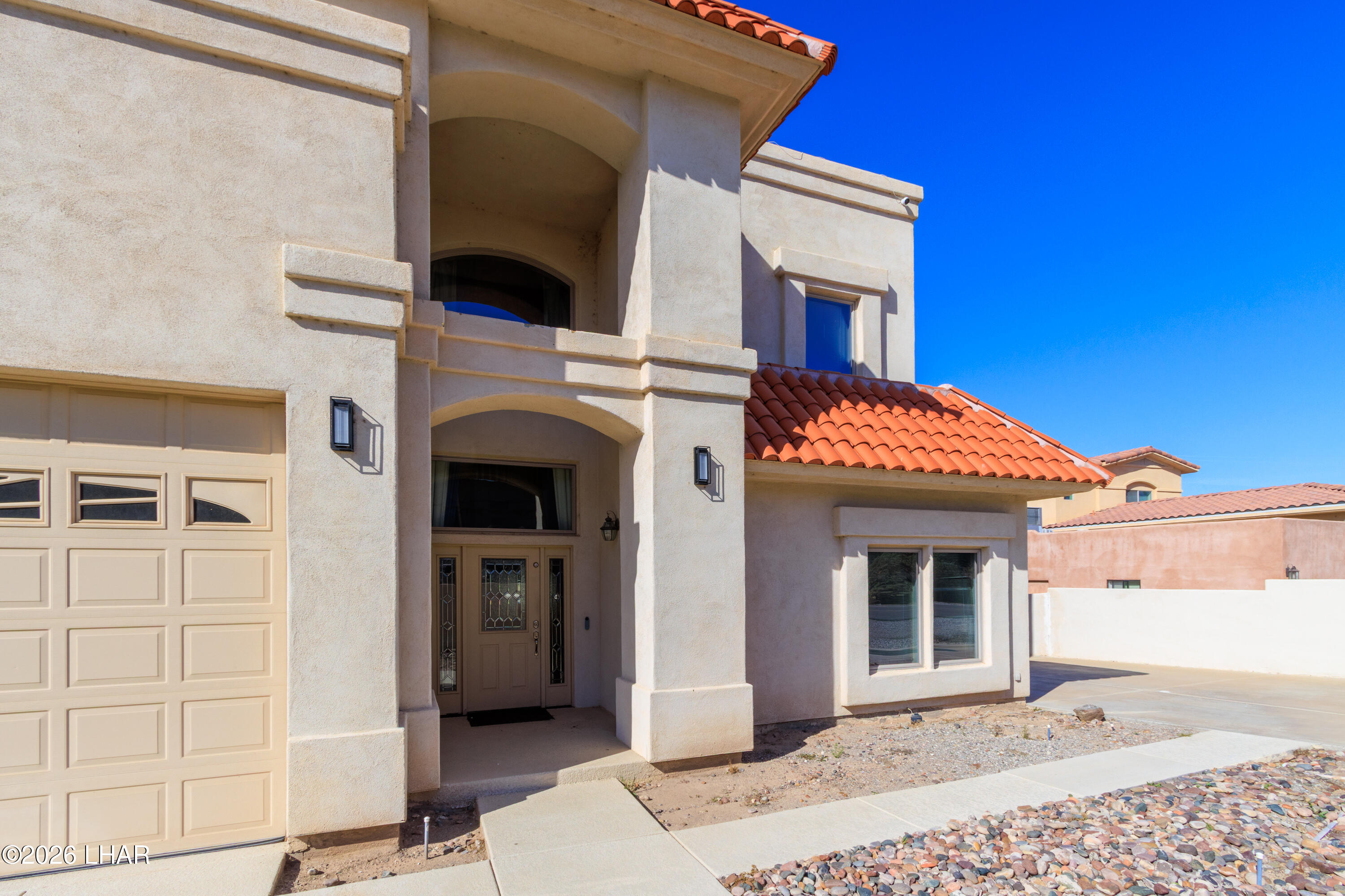 6674 Riverside Drive Parker, AZ 85344 - Photo 10 of 57 a view of a house with a balcony