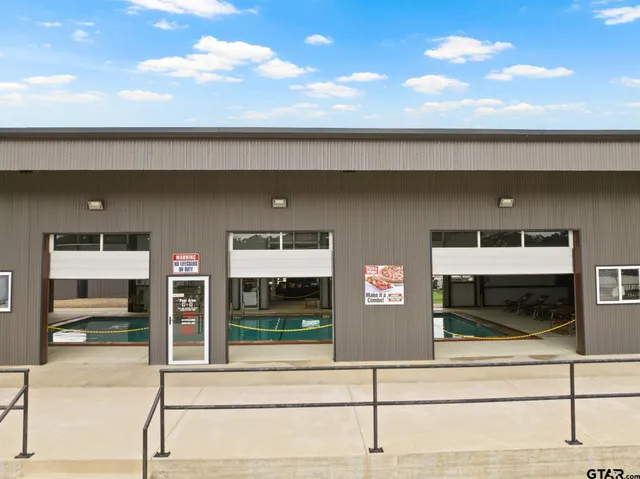 an outdoor space with lounge chair