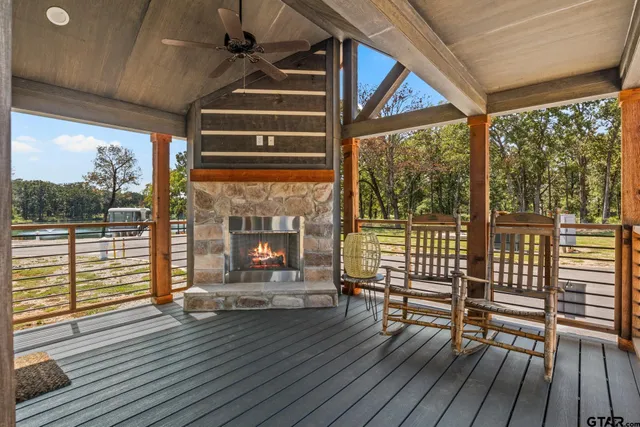 a view of porch with wooden floor