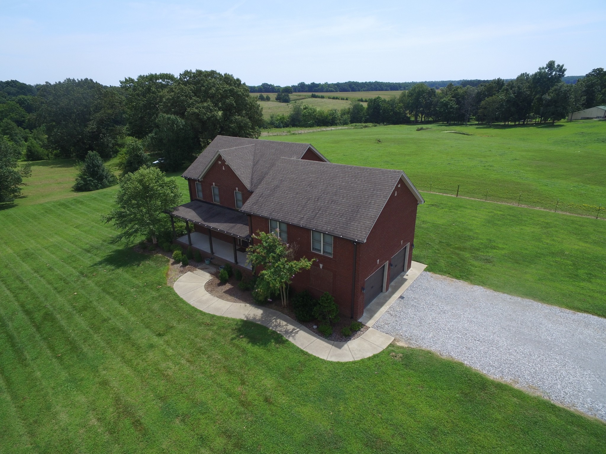 5325 Fred Perry Road Springfield, TN 37172 - Photo 2 of 26 a aerial view of a house with garden space and street view