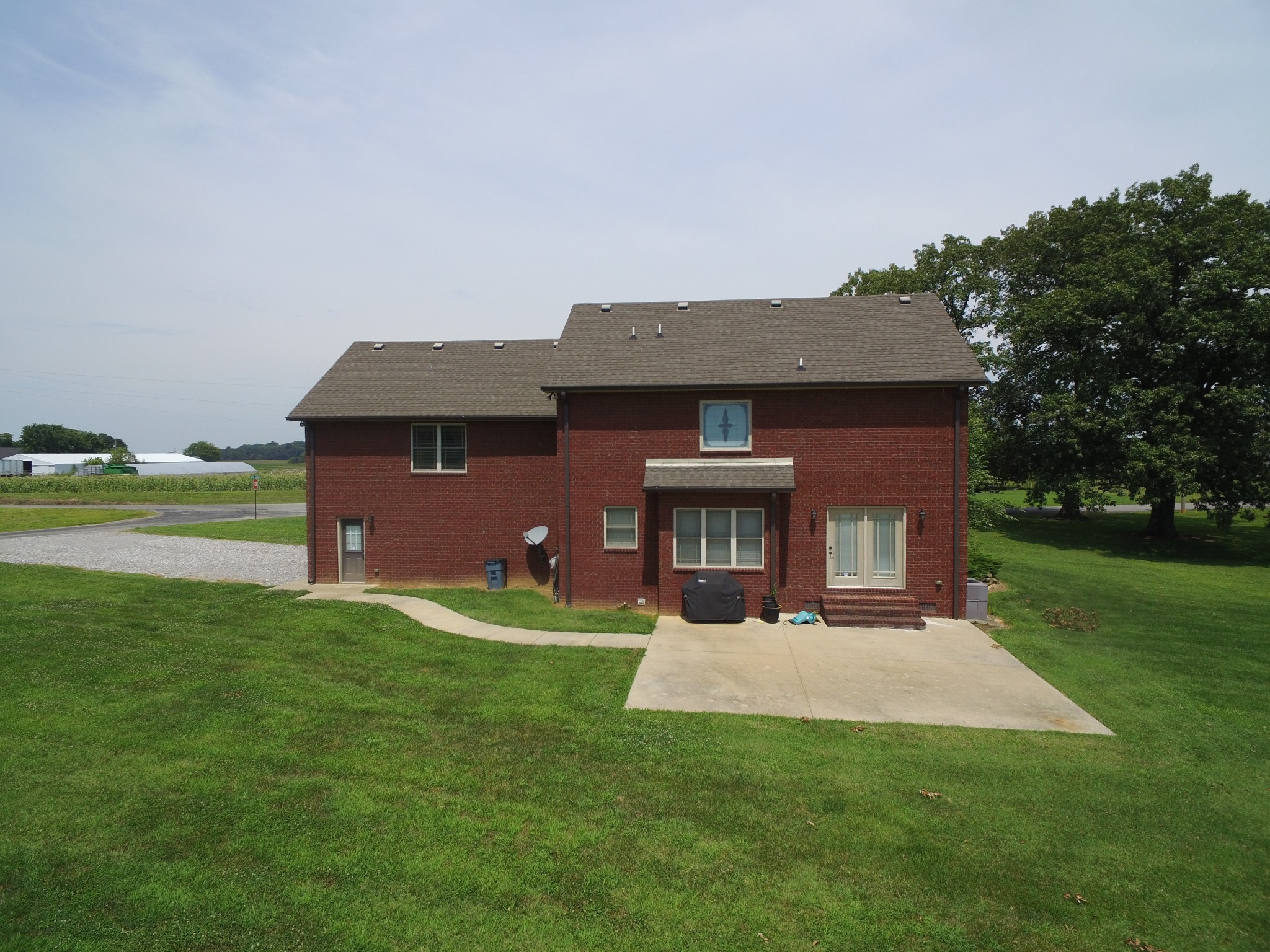 5325 Fred Perry Road Springfield, TN 37172 - Photo 24 of 26 a front view of a house with a yard and road