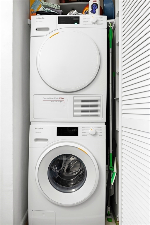 30 Stearns Road, Unit 201 Brookline, MA 02446 - Photo 22 of 29 a utility room with dryer and washer