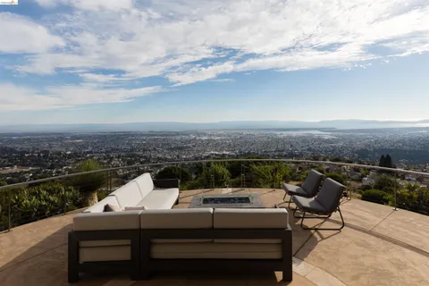 a view of a terrace with chairs