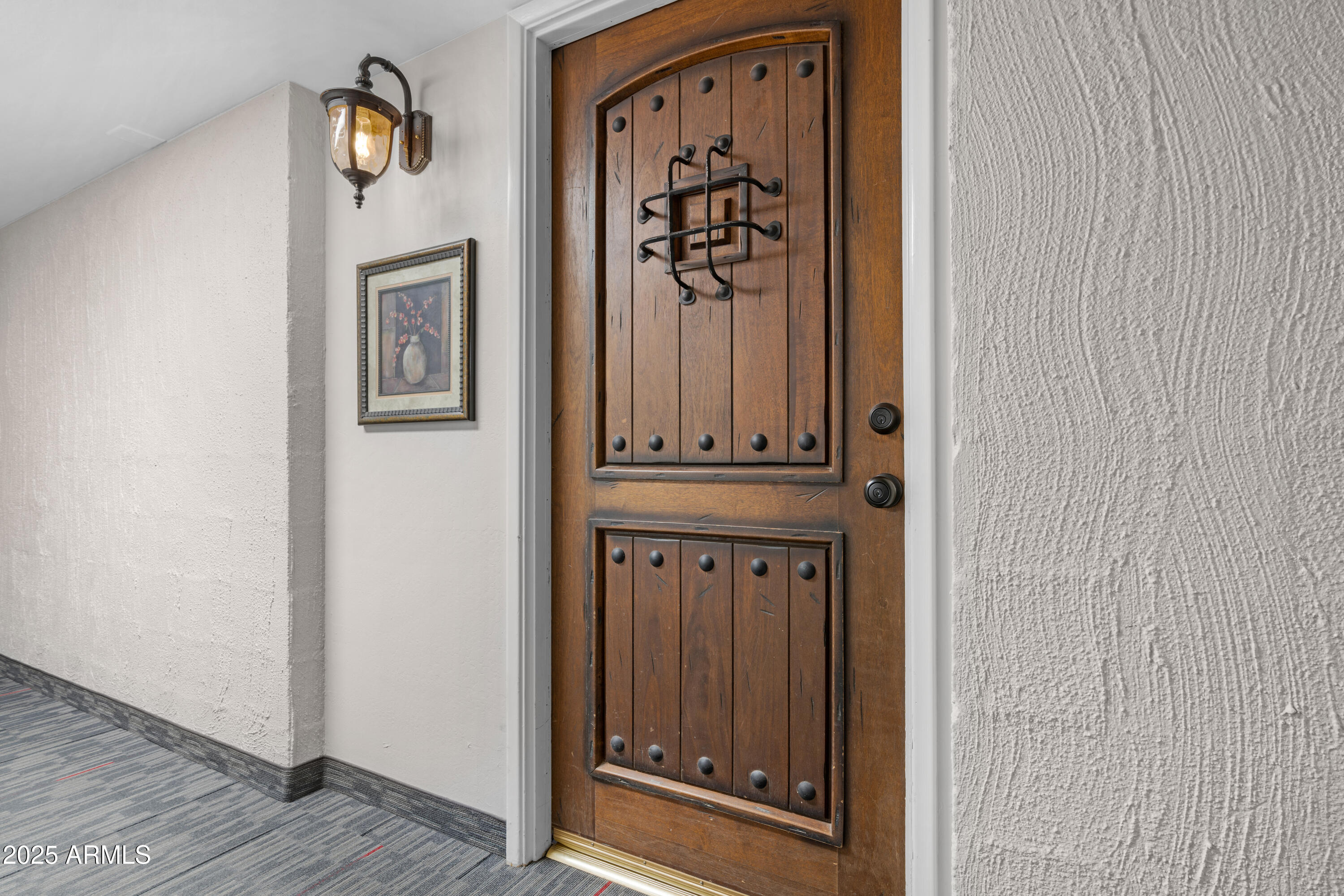 7820 East Camelback Road, Unit 510 Scottsdale, AZ 85251 - Photo 23 of 50 a view of an entryway with wooden floor