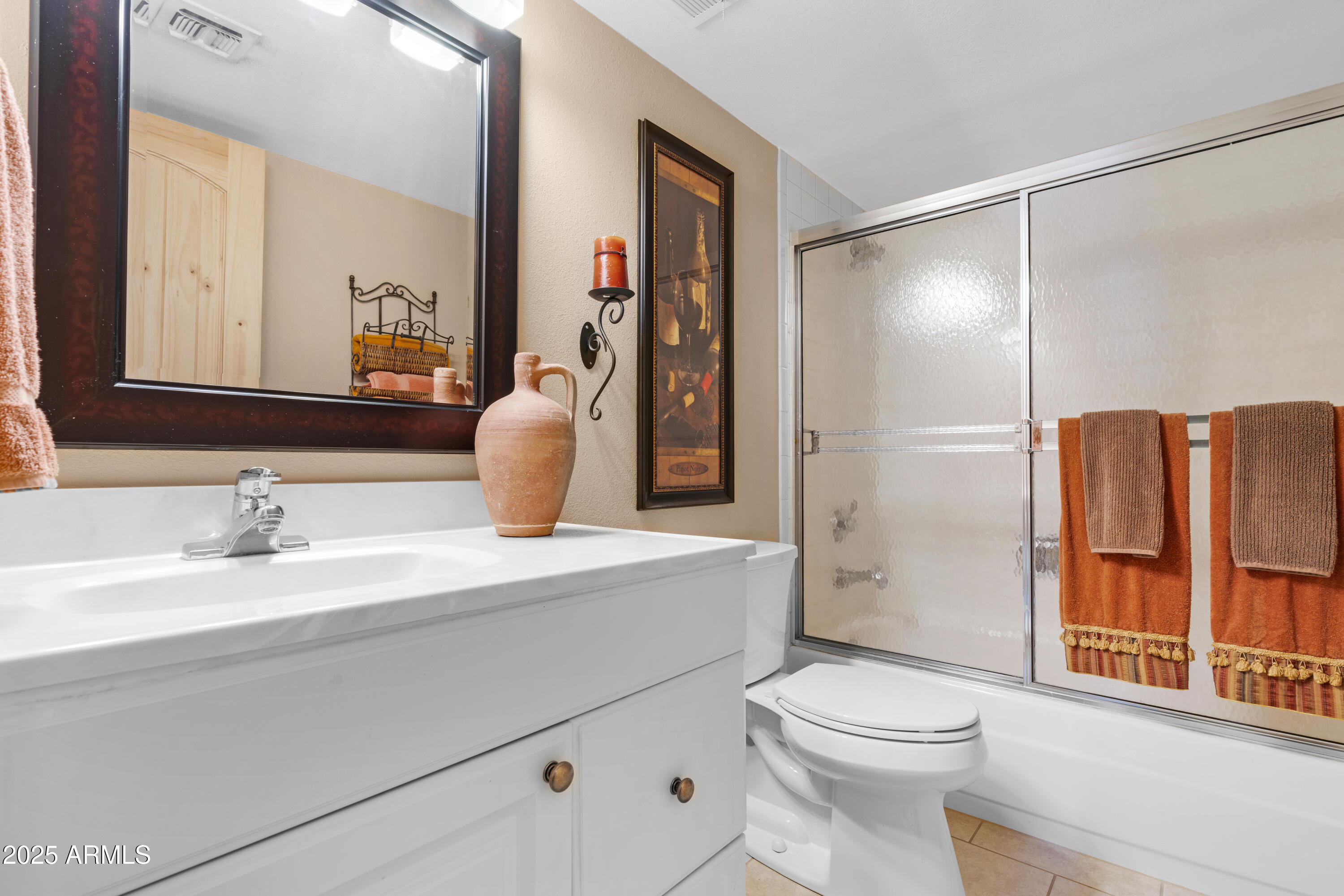 7820 East Camelback Road, Unit 510 Scottsdale, AZ 85251 - Photo 28 of 50 a bathroom with a sink a toilet and shower