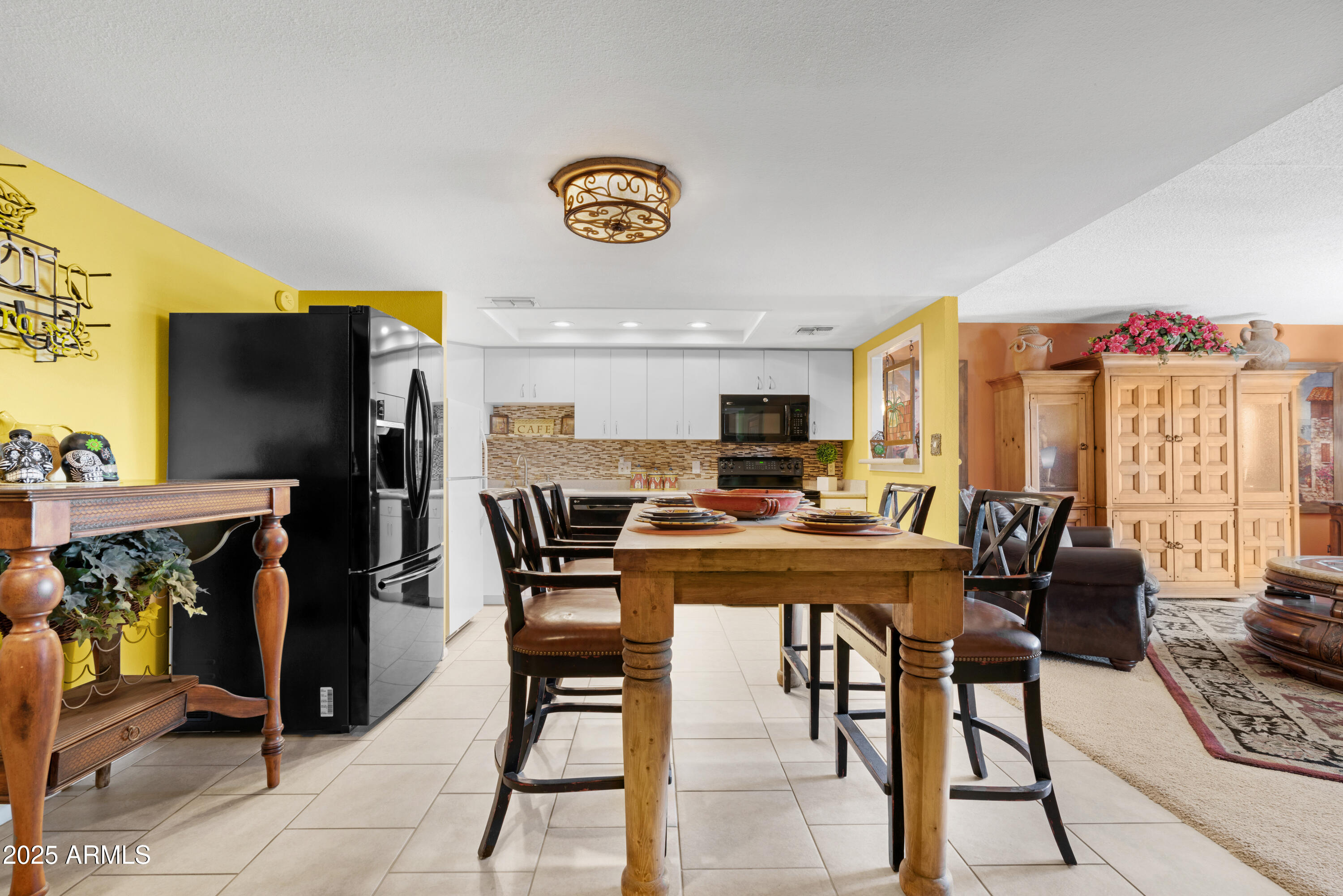 7820 East Camelback Road, Unit 510 Scottsdale, AZ 85251 - Photo 37 of 50 a view of a dining room with furniture and a window