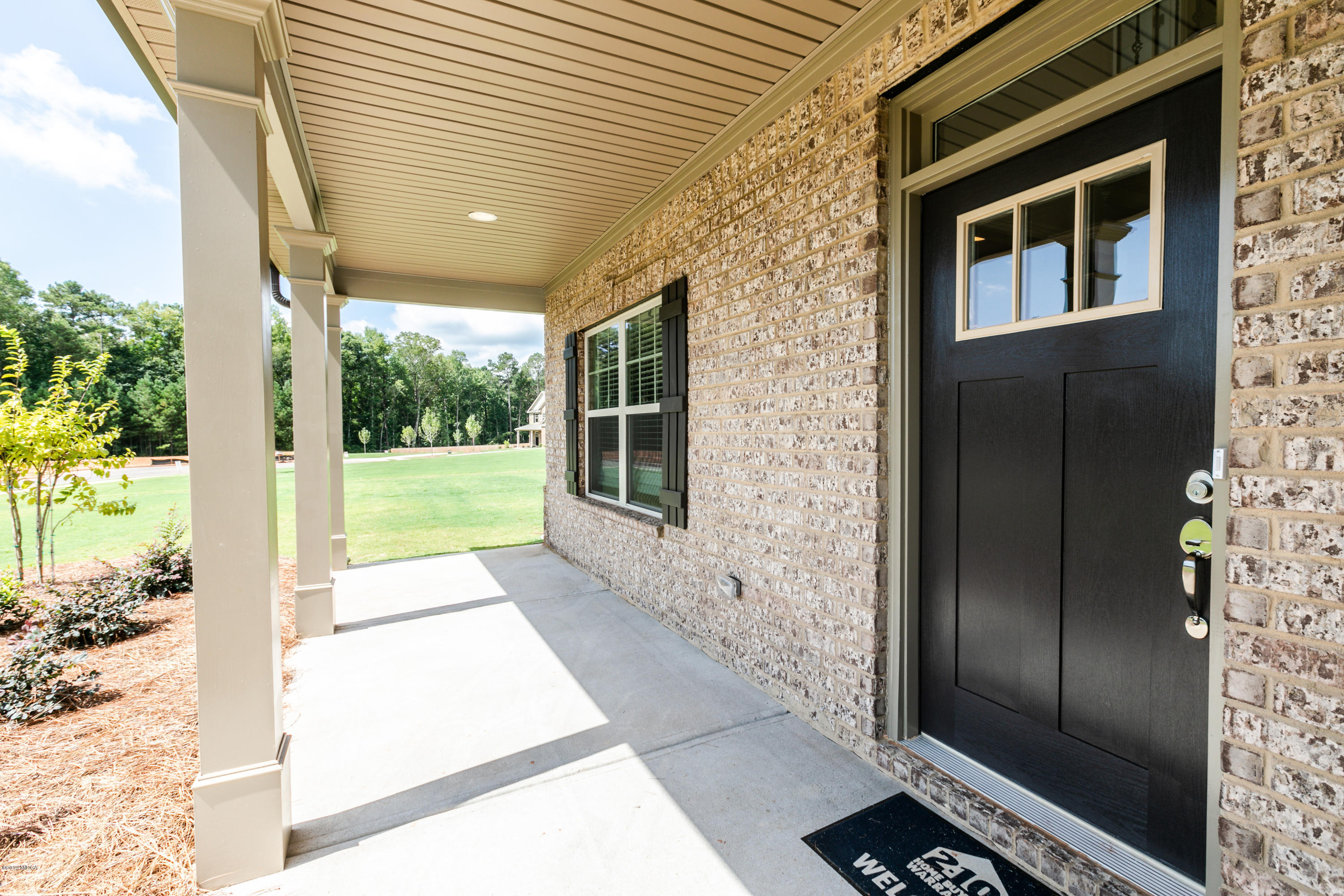 160 Homestead Circle Forsyth, GA 31029 - Photo 2 of 40 a view of front door