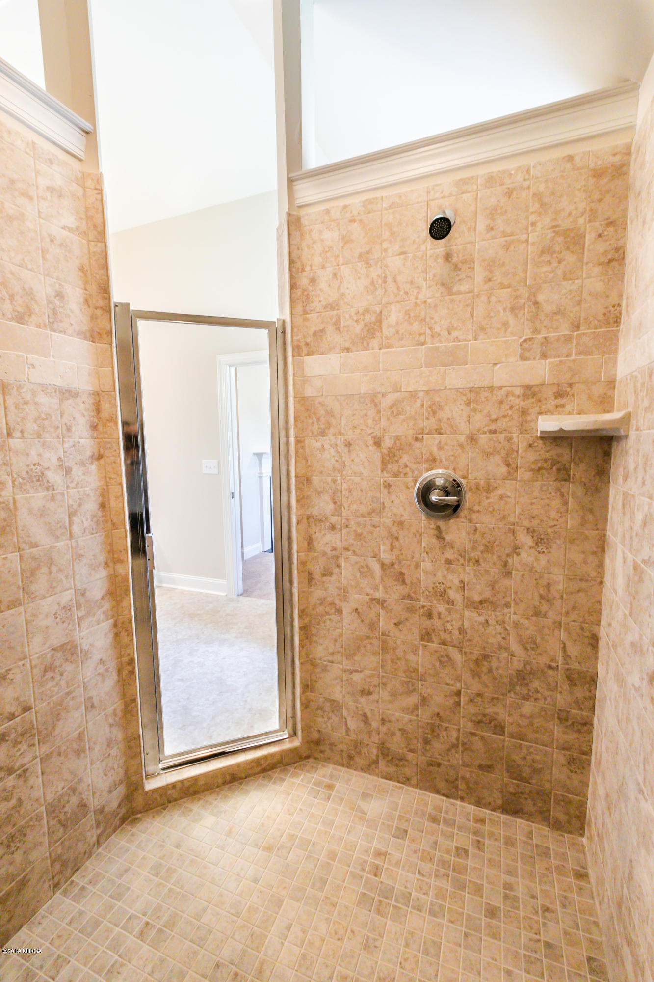 160 Homestead Circle Forsyth, GA 31029 - Photo 26 of 40 a bathroom with a shower
