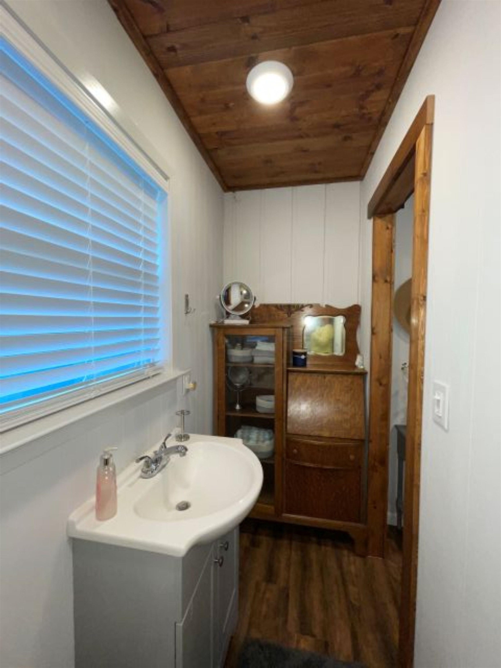 602 Sycamore Road Burnet, TX 78611 - Photo 19 of 26 a bathroom with a sink toilet and shower