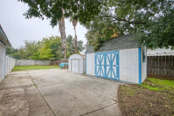 a house with trees in front of it