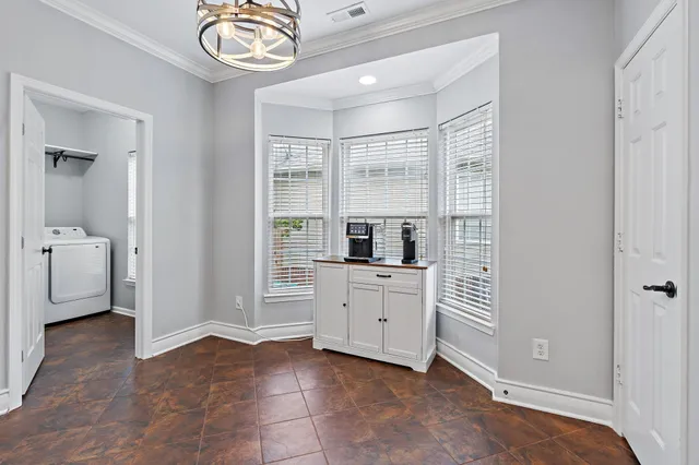 a view of kitchen and windows