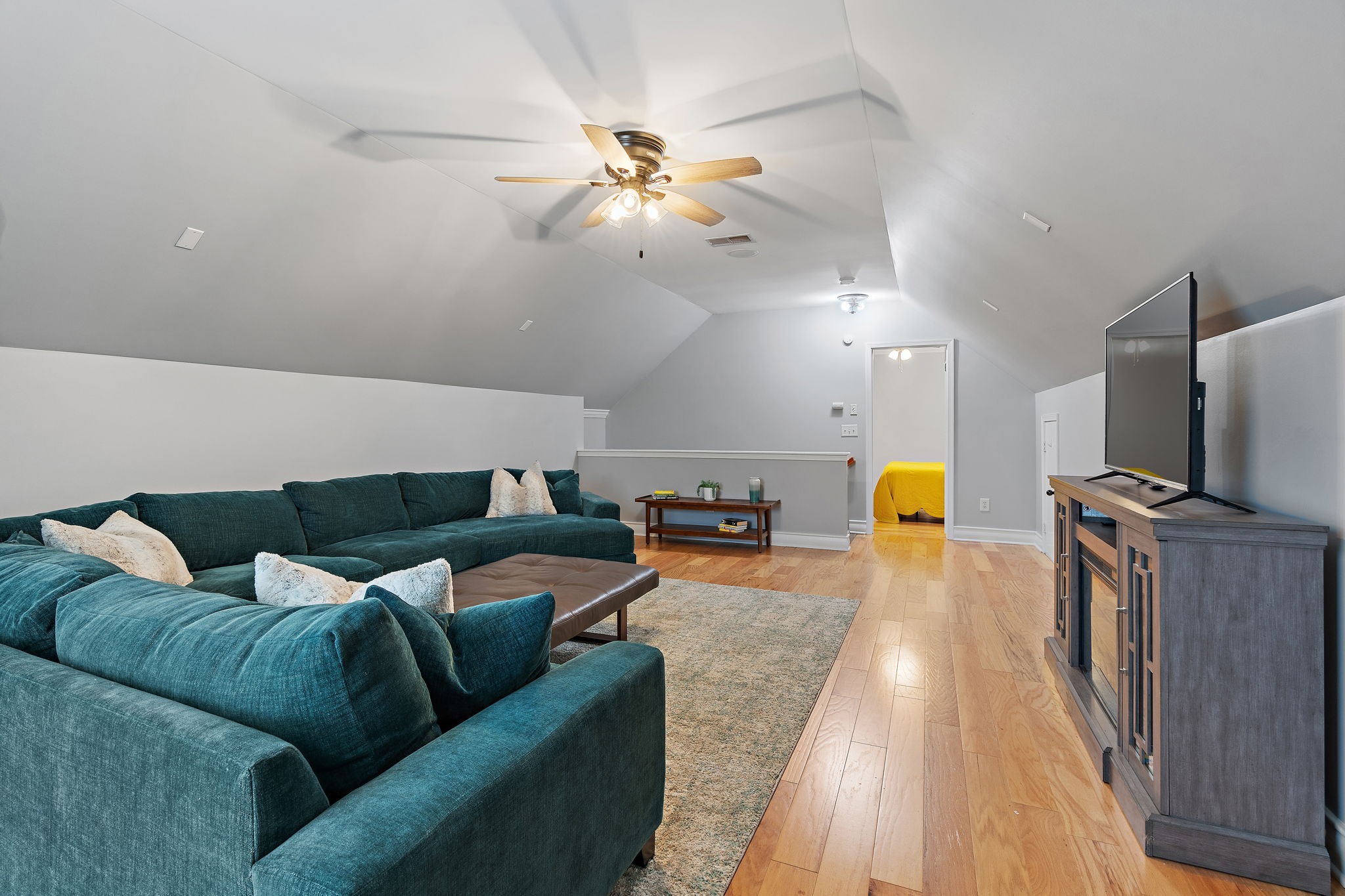 1025 Countess Lane Spring Hill, TN 37174 - Photo 24 of 38 a living room with furniture and a flat screen tv