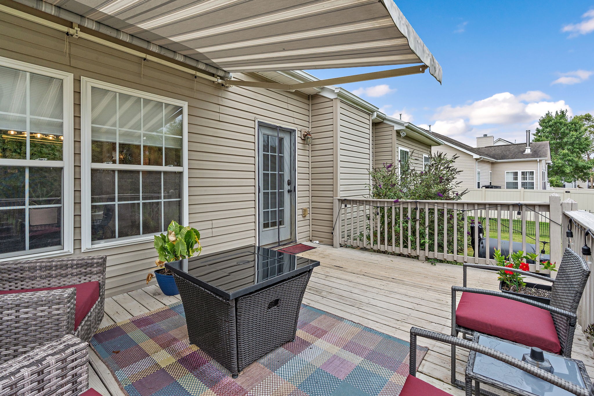 1025 Countess Lane Spring Hill, TN 37174 - Photo 29 of 38 a balcony with furniture and potted plants