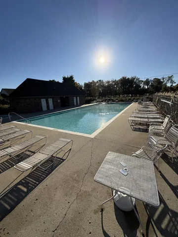 a view of a terrace with chairs