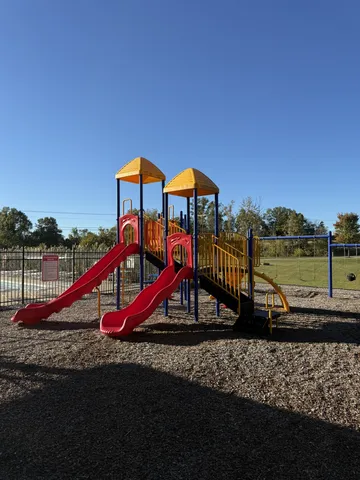a view of a park with slide