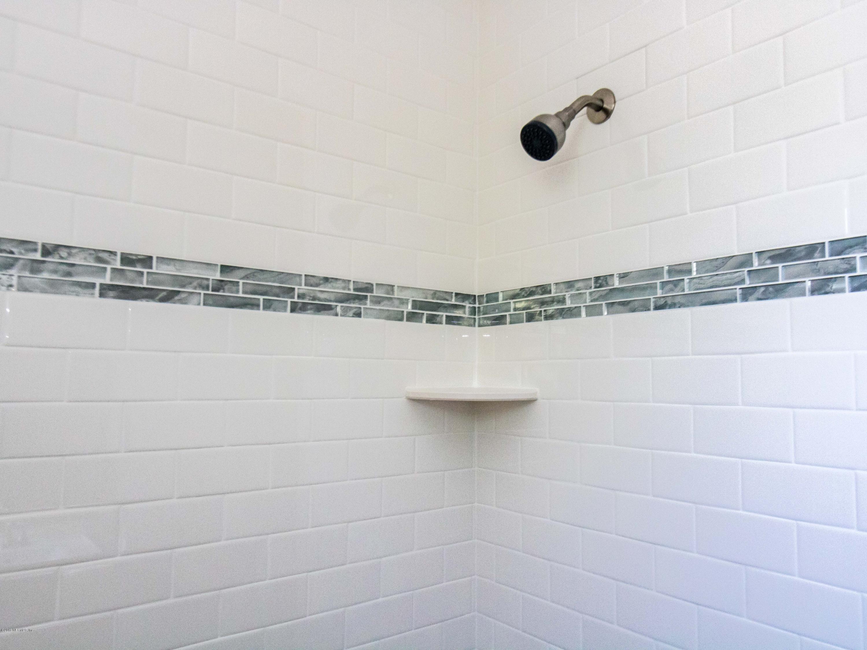 1764 Planters Road Jacksonville, FL 32207 - Photo 20 of 24 a bathroom with a shower