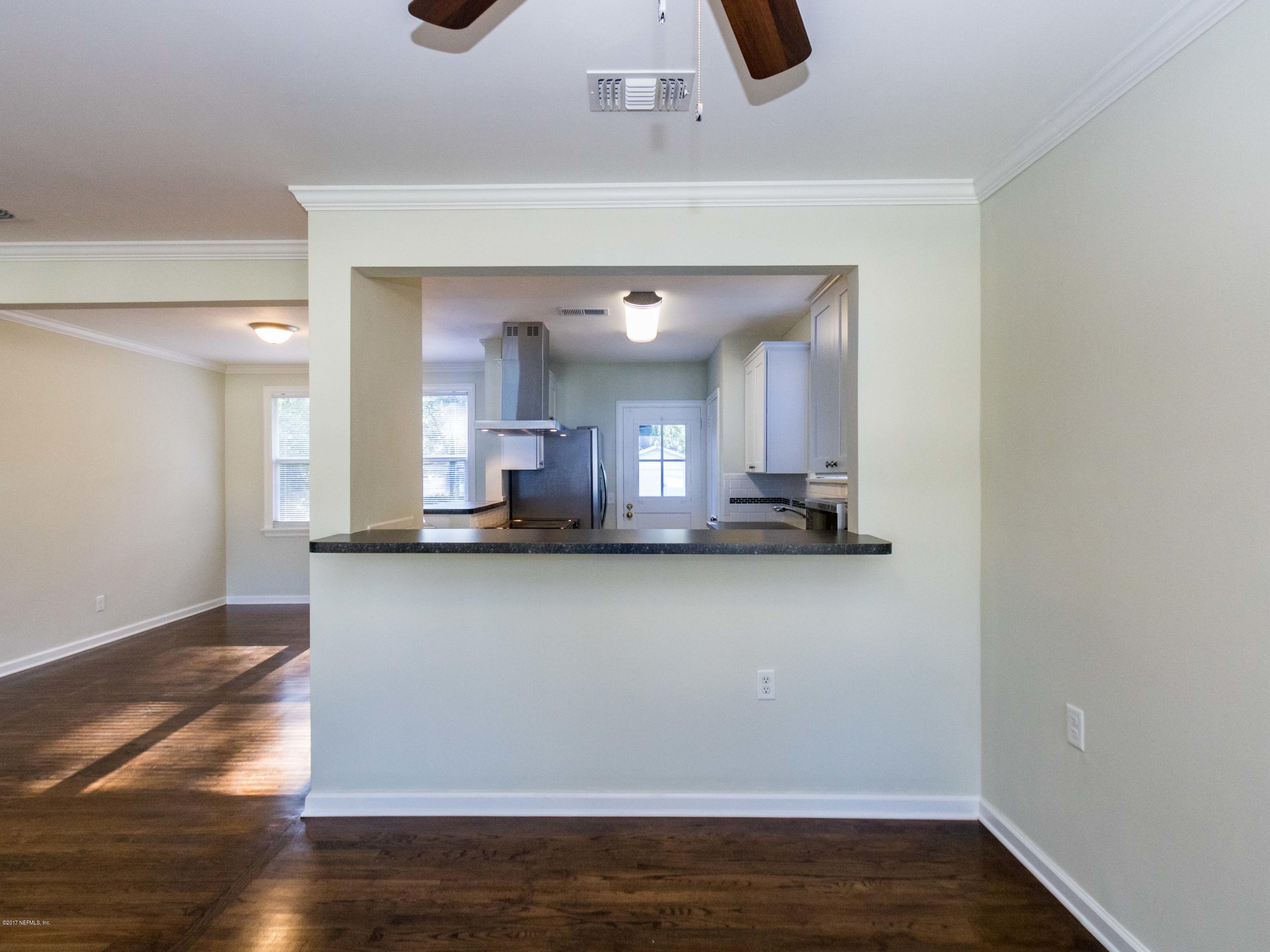 1764 Planters Road Jacksonville, FL 32207 - Photo 9 of 24 a view of kitchen and kitchen with sink