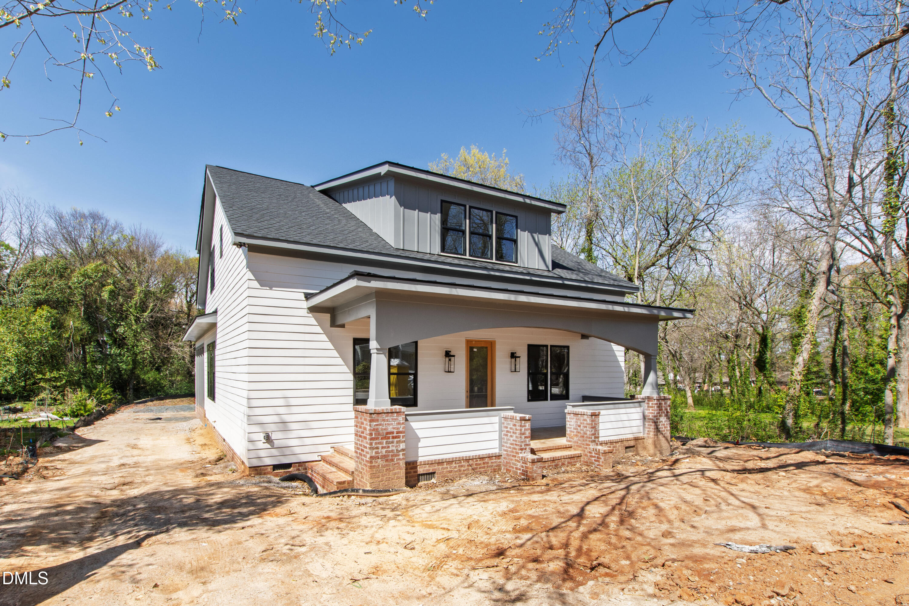 909 Oberlin Road Raleigh, NC 27605 - Photo 51 of 59 a front view of a house with a yard