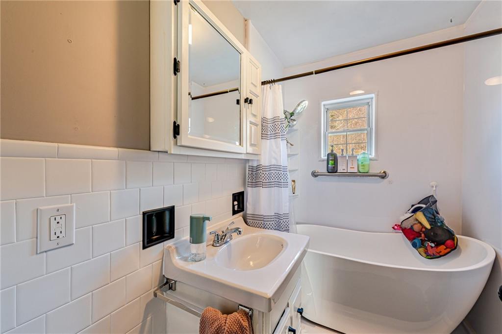 481 Crawford Run Road Cheswick, PA 15024 - Photo 13 of 24 a bathroom with a sink toilet and vanity