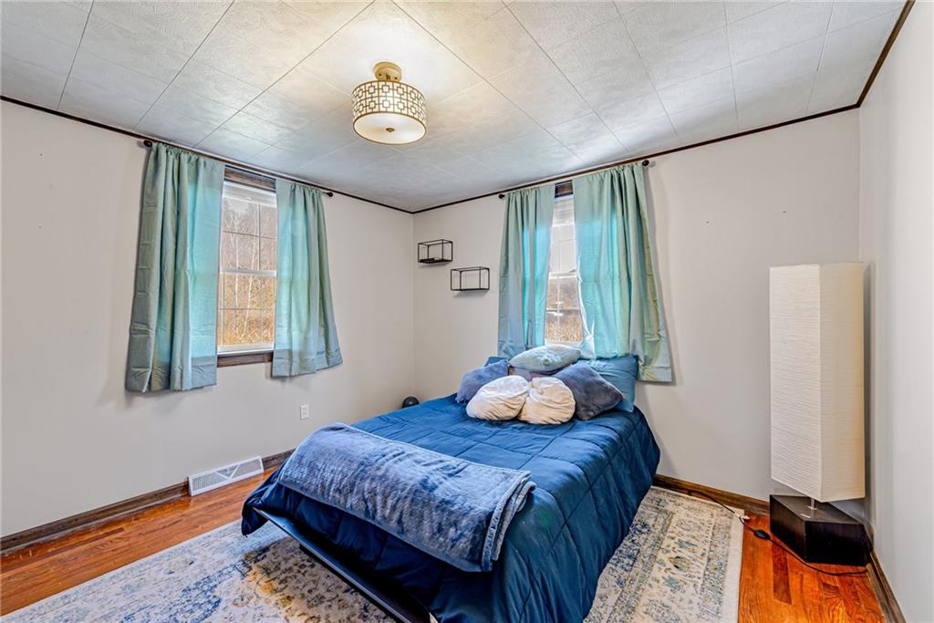 481 Crawford Run Road Cheswick, PA 15024 - Photo 14 of 24 a bedroom with a bed and a window