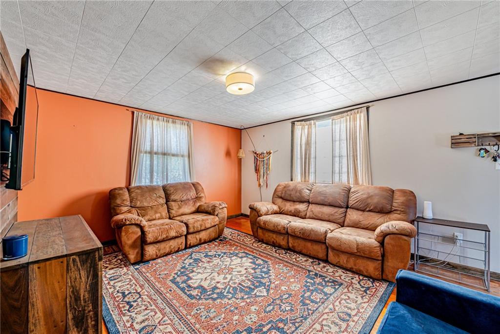 481 Crawford Run Road Cheswick, PA 15024 - Photo 5 of 24 a living room with furniture and a large window