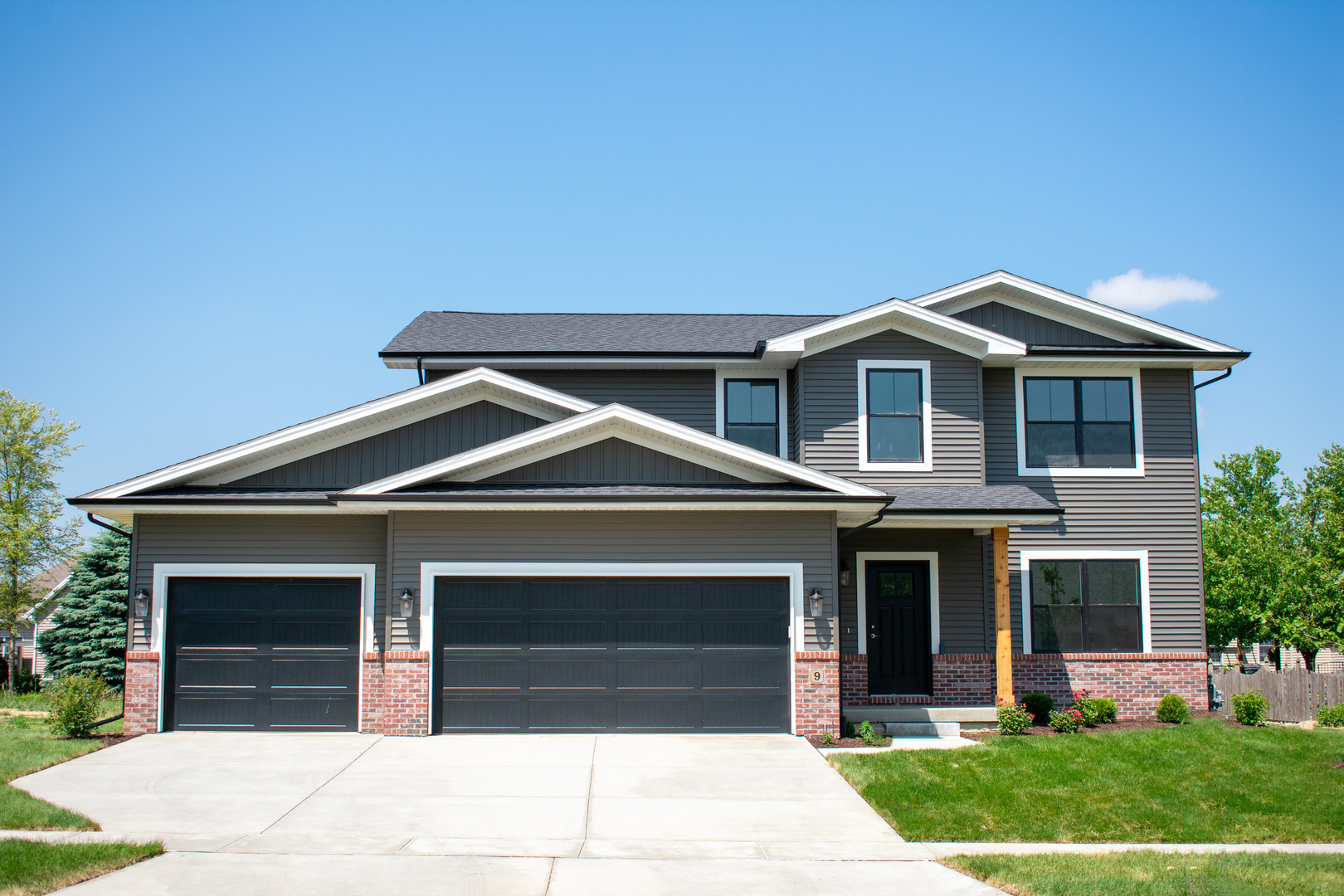 9 Brookstone Circle Bloomington, IL 61704 - Photo 1 of 40 a front view of a house with a yard