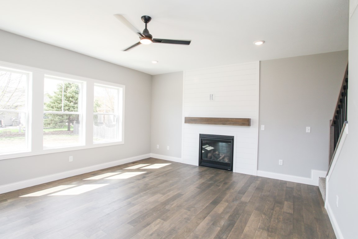 9 Brookstone Circle Bloomington, IL 61704 - Photo 18 of 40 an empty room with windows and a fireplace