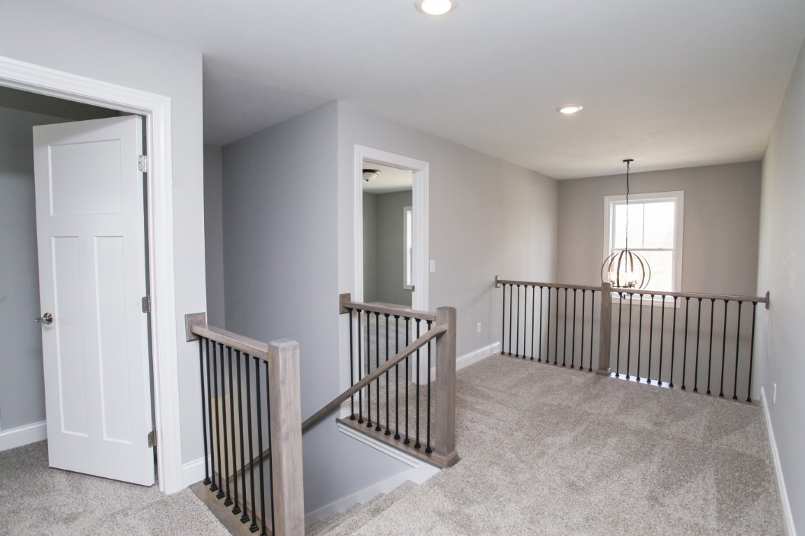 9 Brookstone Circle Bloomington, IL 61704 - Photo 19 of 40 a view of a hallway with windows