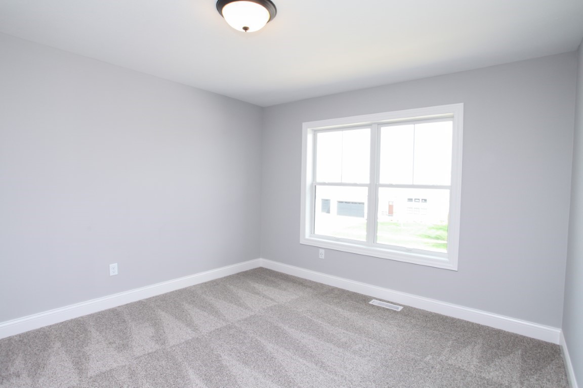 9 Brookstone Circle Bloomington, IL 61704 - Photo 20 of 40 an empty room with a window