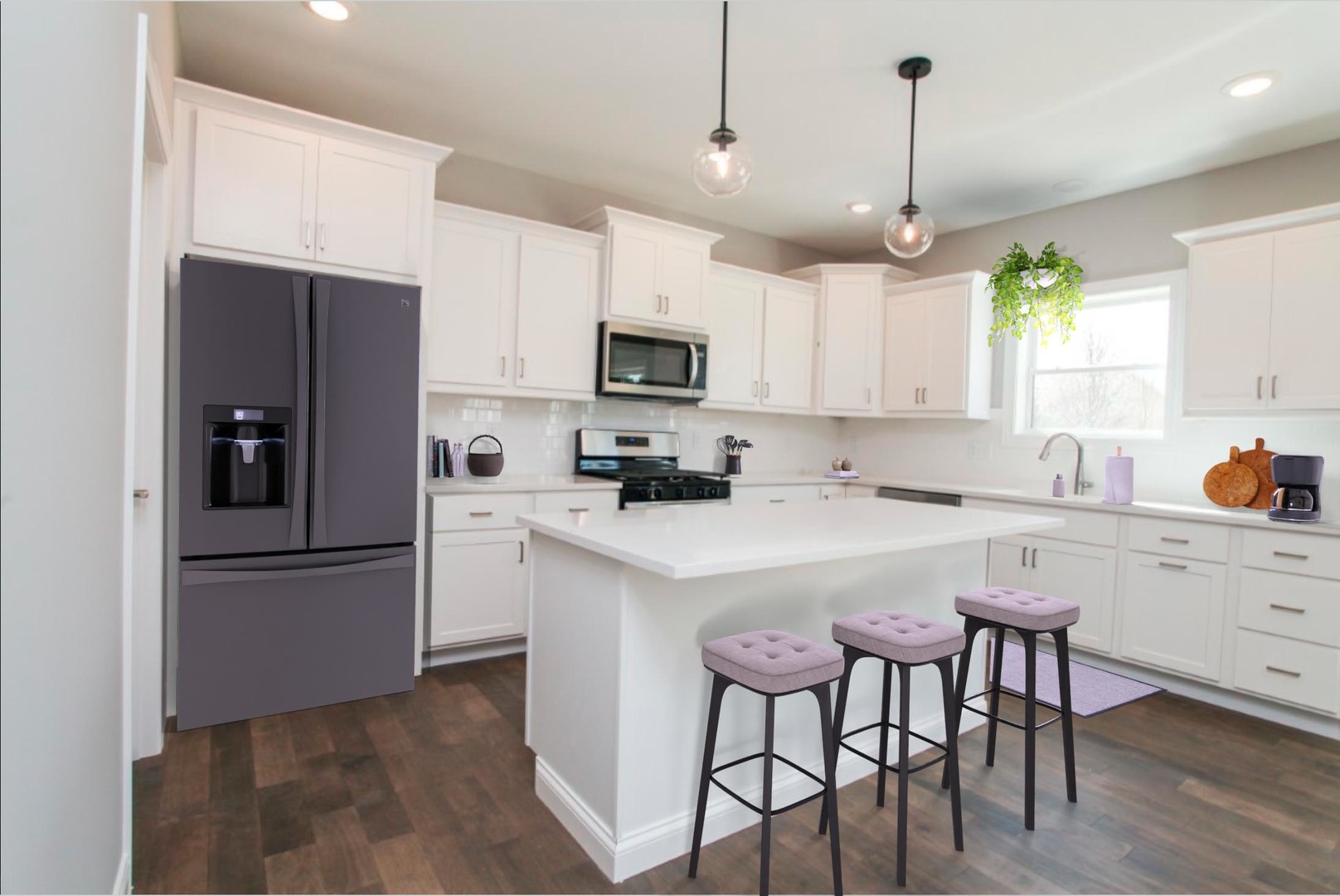 9 Brookstone Circle Bloomington, IL 61704 - Photo 2 of 40 a kitchen with a refrigerator a microwave a stove and white cabinets