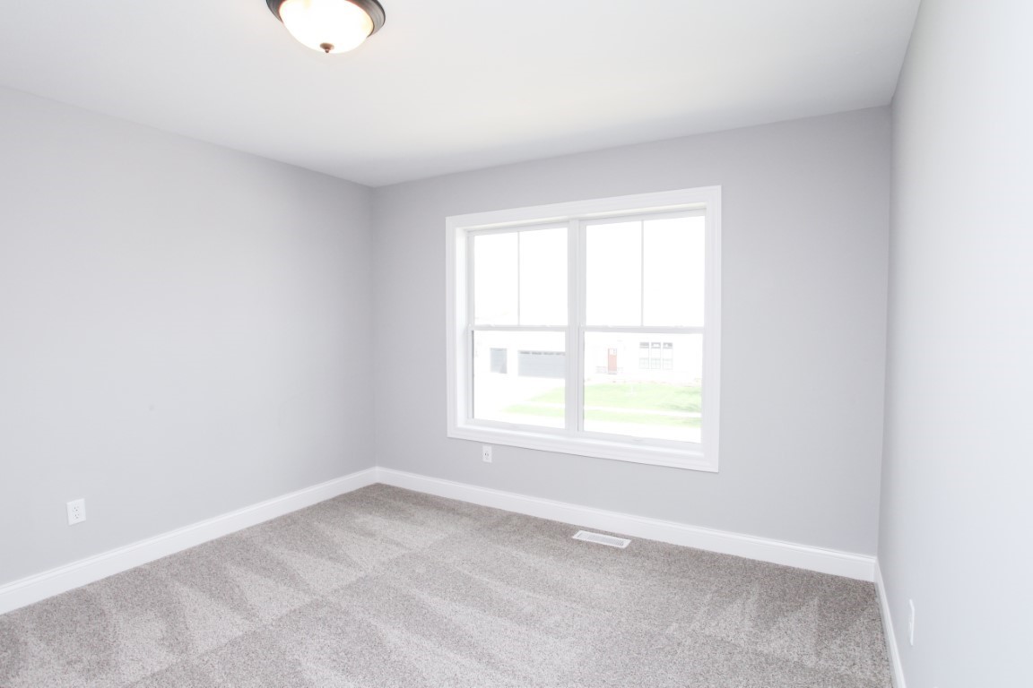 9 Brookstone Circle Bloomington, IL 61704 - Photo 22 of 40 an empty room with a window
