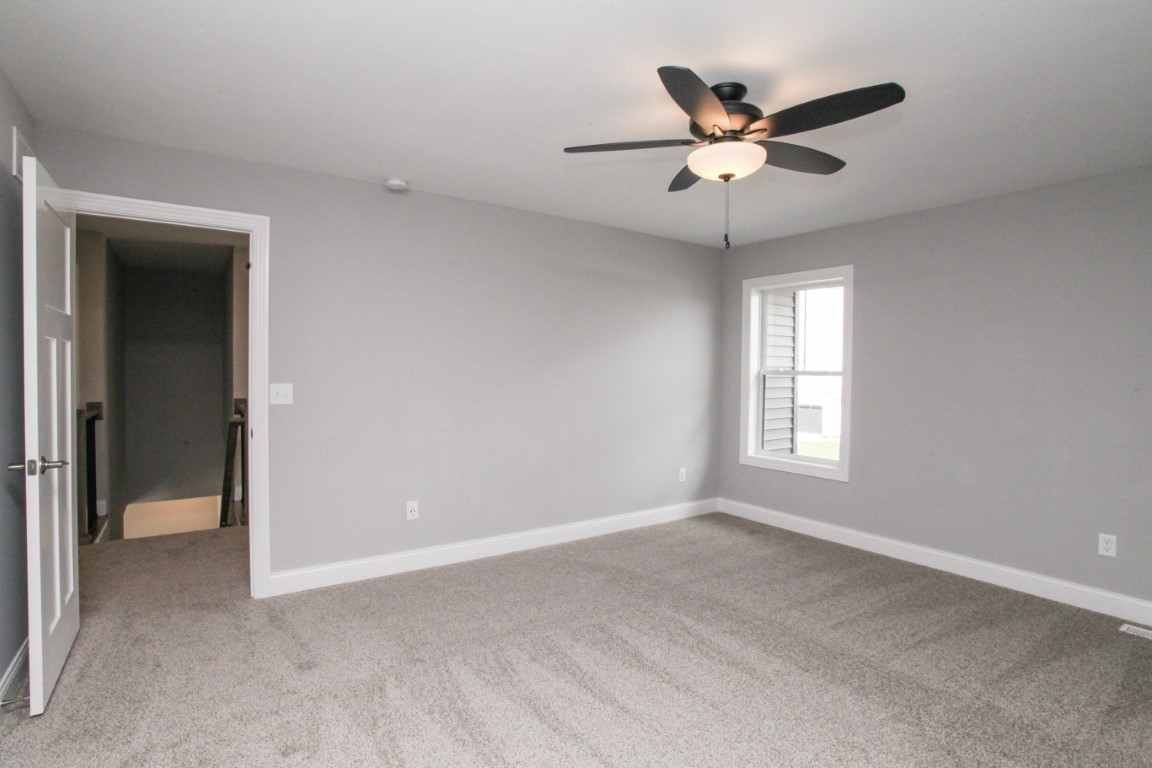 9 Brookstone Circle Bloomington, IL 61704 - Photo 29 of 40 a view of an empty room with a window