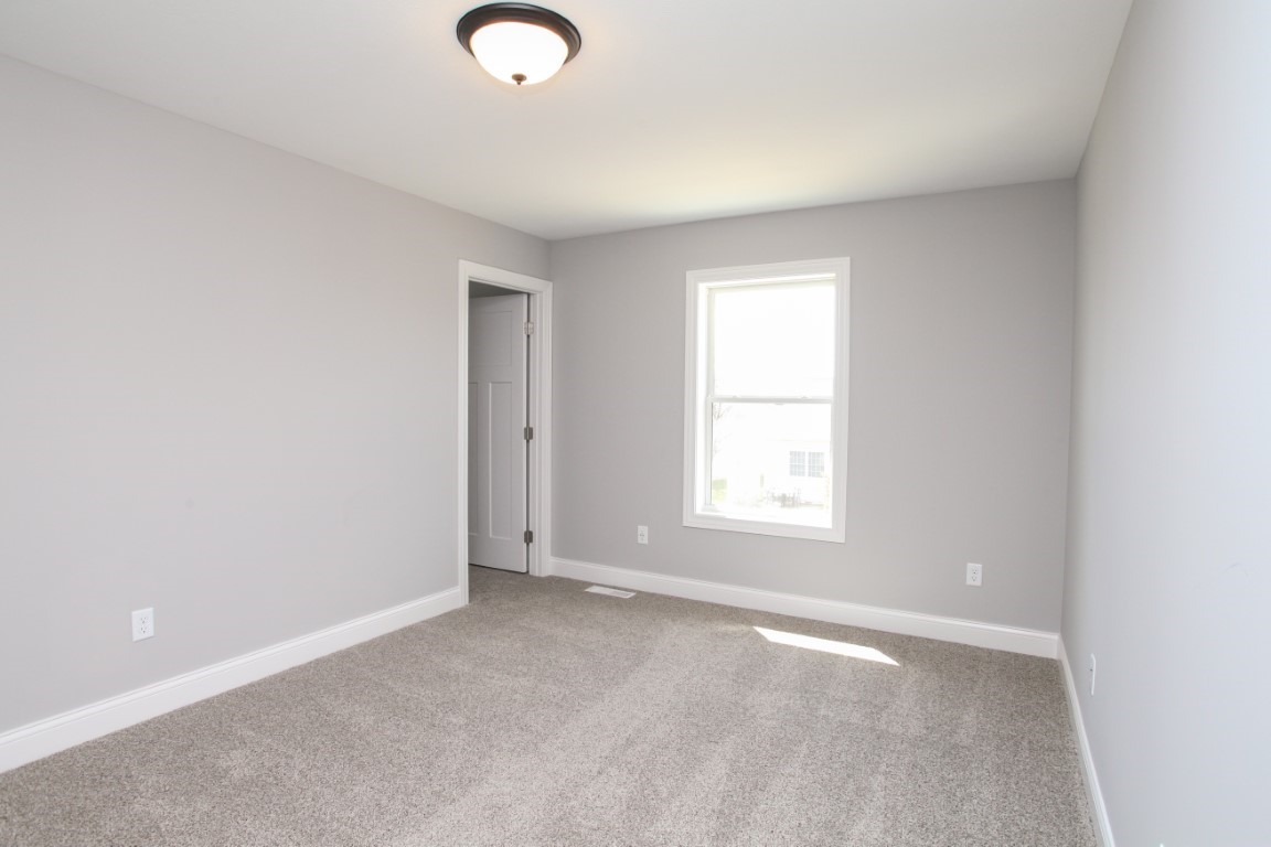 9 Brookstone Circle Bloomington, IL 61704 - Photo 30 of 40 an empty room with windows