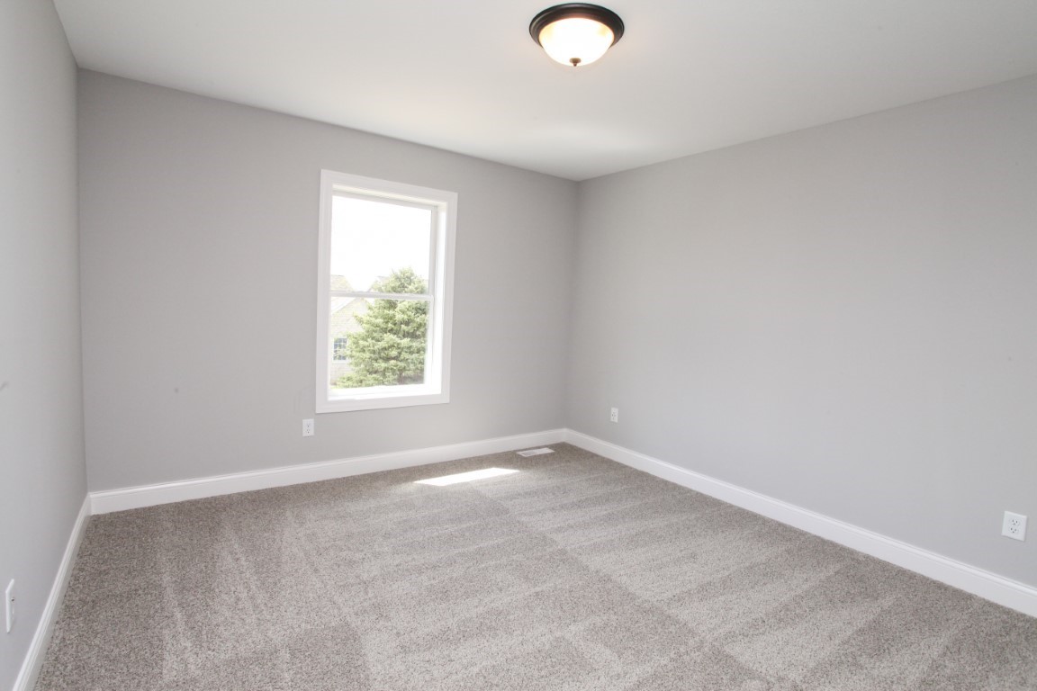 9 Brookstone Circle Bloomington, IL 61704 - Photo 34 of 40 an empty room with windows