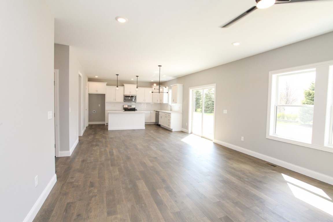 9 Brookstone Circle Bloomington, IL 61704 - Photo 36 of 40 a view of a kitchen with windows and refrigerator
