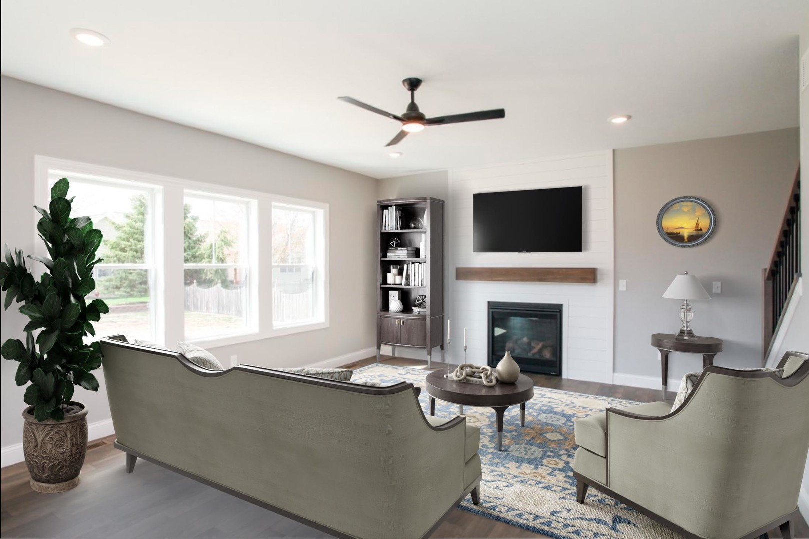 9 Brookstone Circle Bloomington, IL 61704 - Photo 4 of 40 a living room with furniture a fireplace and a flat screen tv