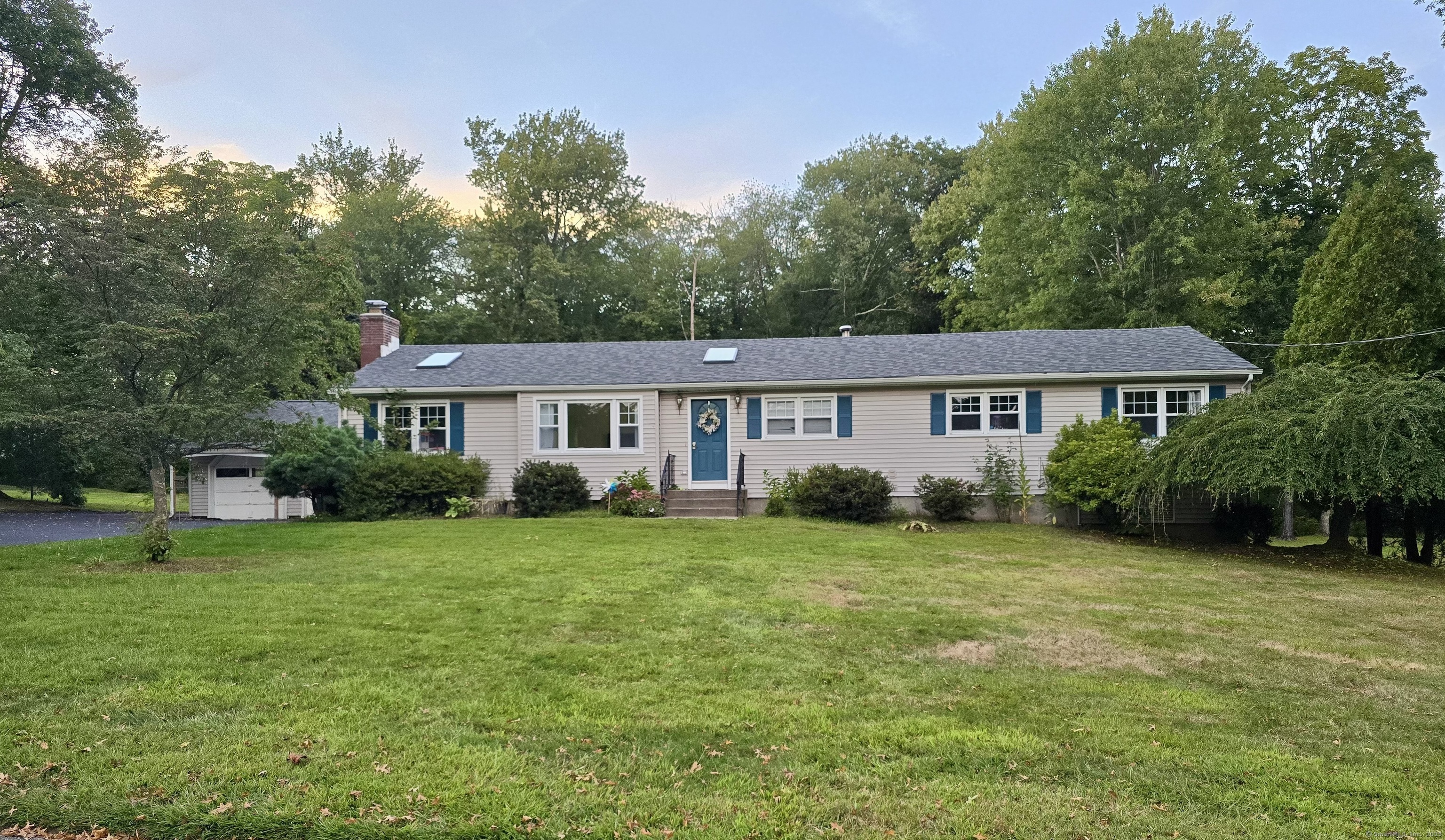 43 Jog Hill Road Trumbull, CT 06611 - Photo 1 of 1 a front view of a house with a garden