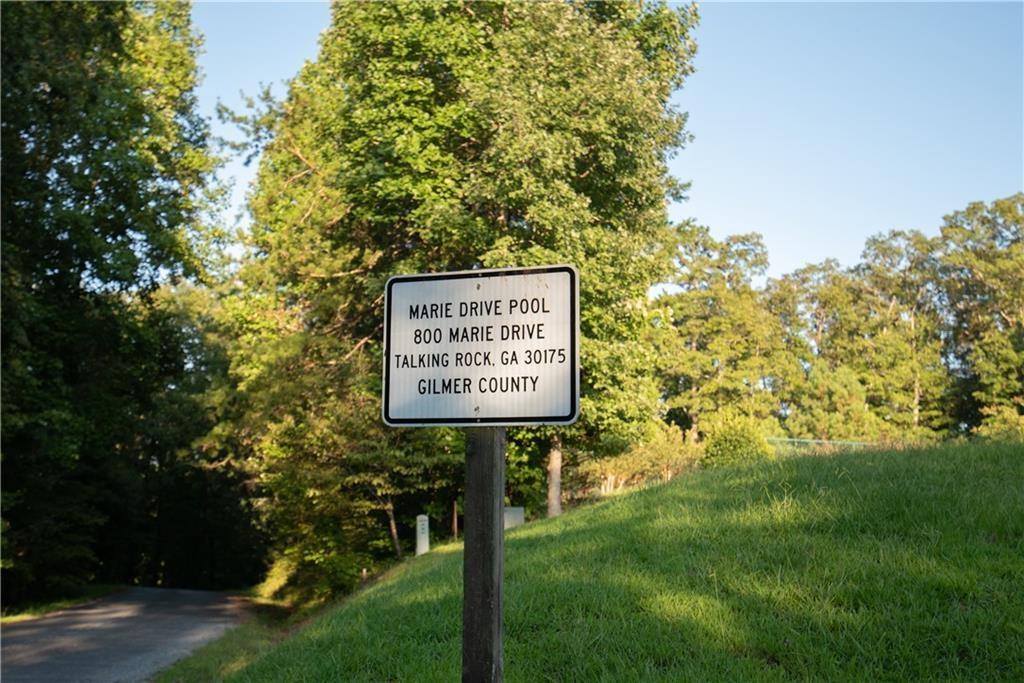 169 Jasmine Drive Ranger, GA 30734 - Photo 57 of 61 a sign that is sitting on a green field