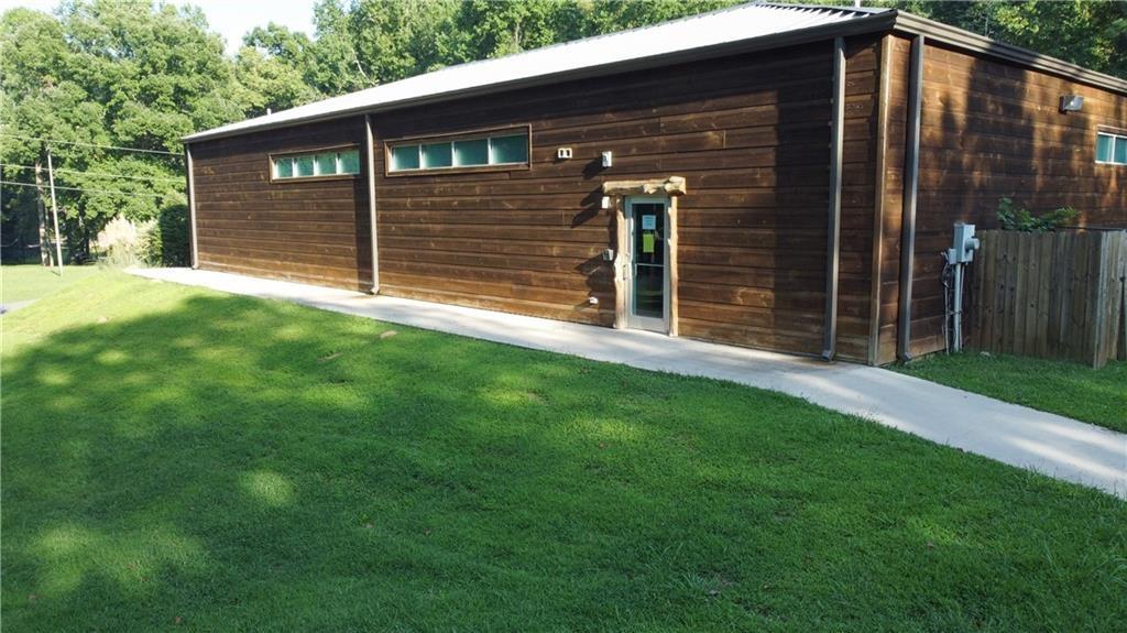 169 Jasmine Drive Ranger, GA 30734 - Photo 58 of 61 a front view of a house with a yard