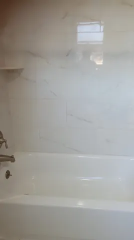 a bathroom with a bathtub